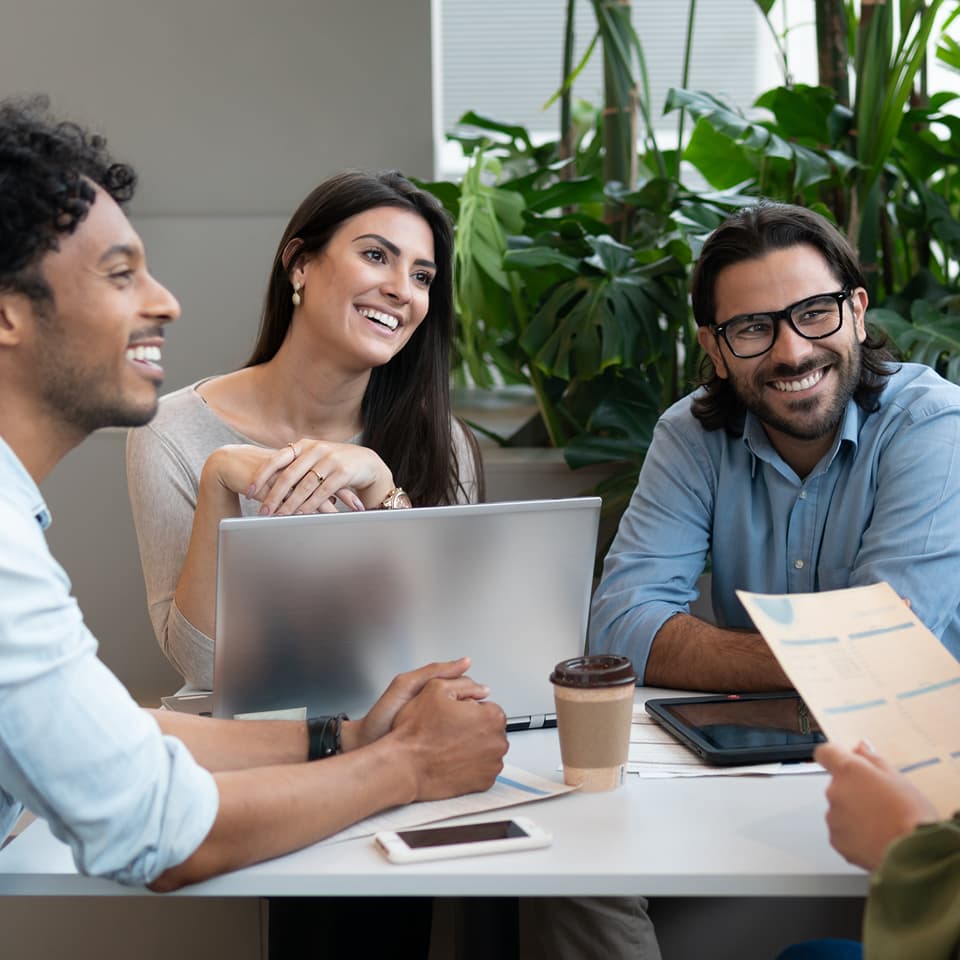 Coworkers sitting in a meeting together